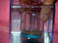 Baby food jar submerged upsidedown